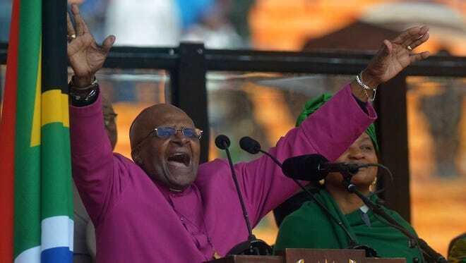 South African Archbishop and Honorary Elders Desmond Tutu speaks during the memorial service of South African former president Nelson Mandela at the FNB Stadium (Soccer City) in Johannesburg on December 10, 2013. Mandela, the revered icon of the anti-apartheid struggle in South African and one of the towering political figures of the 20th century, died in Johannesburg on December 5 at the age of 95. Alexander Joe, AFP/Getty Images