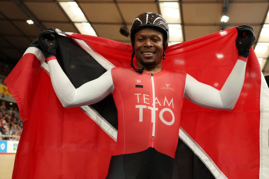 TT's Nicholas Paul celebrates after winning the Men's keirin gold final during the Commonwealth Games track cycling at Lee Valley VeloPark in London on Saturday. - AP PHOTO (via newsday.co.tt)