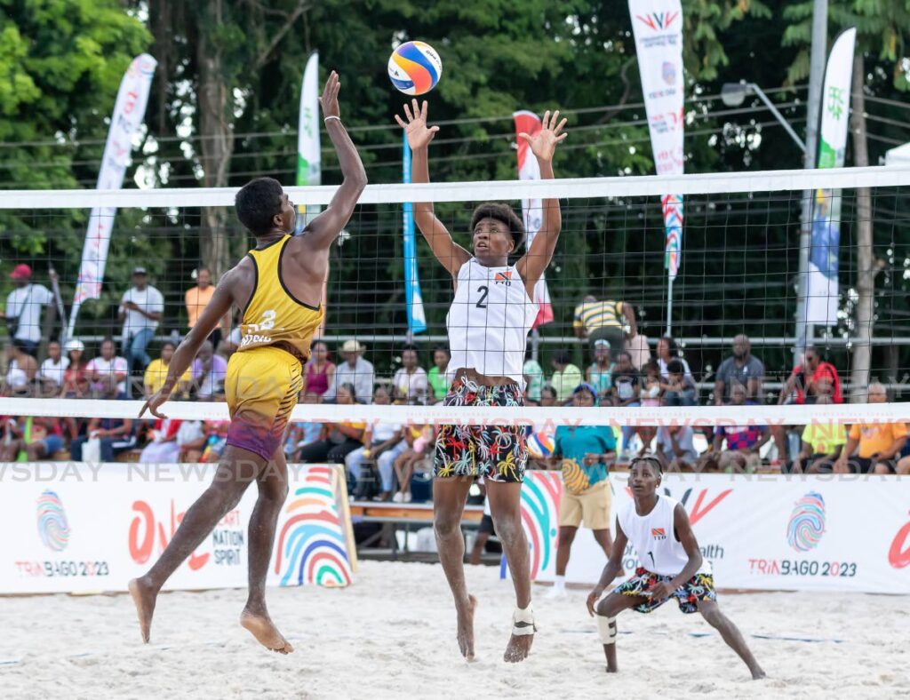 TT boys' (white) volleyballers defend against Sri Lanka during their game at the 2023 Commonwealth Youth Games, at the Courlad Beach Sports Arena, in Black Rock, Tobago, - Photo by David Reid (Image obtained at newsday.co.tt)