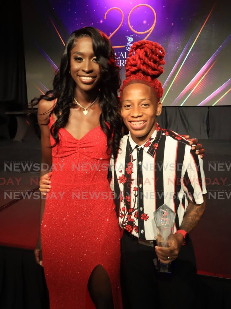 Cyclist Teniel Campbell (L) stands alongside the TT Olympic Committee’s (TTOC) Sportswoman of the Year 2023 sprinter Michelle-Lee Ahye at the TTOC awards ceremony, on Friday, at the Hyatt Regency, Port of Spain. - ROGER JACOB (Image obtained at newsday.co.tt)
