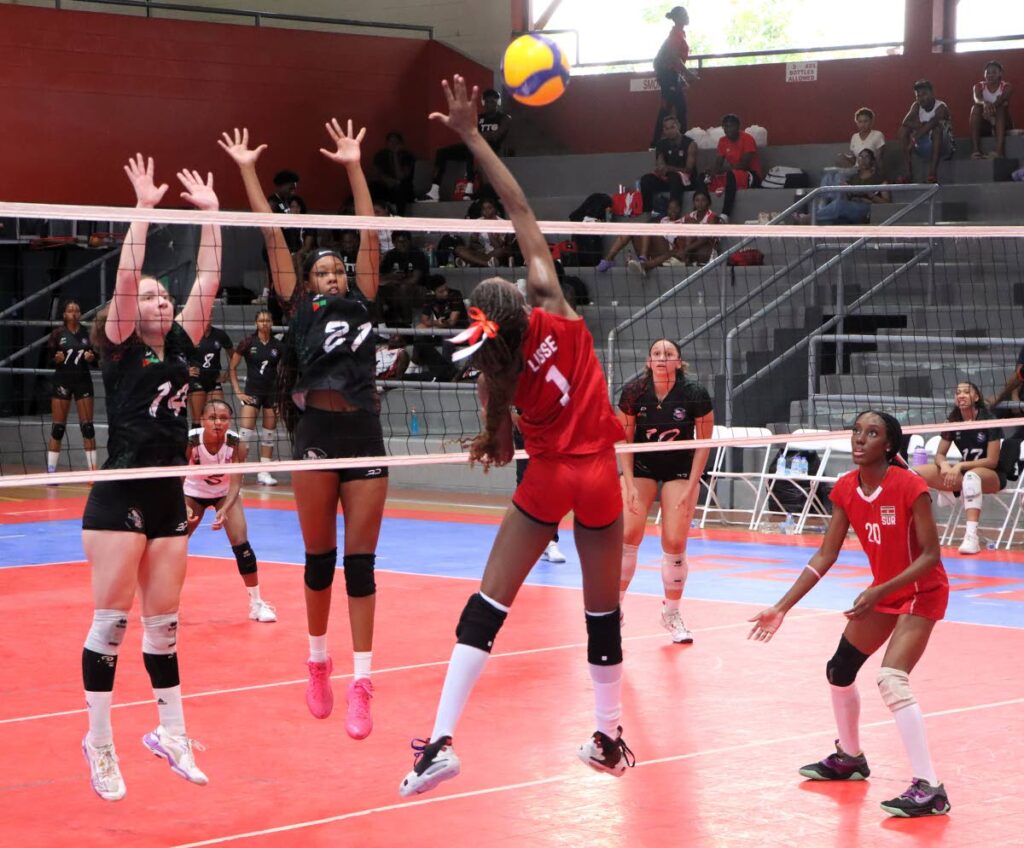 A Suriname player goes for a spike in their game against Martinique at the Caribbean Zonal Volleyball Championship at the Maloney Regional Complex, on July 13. - Photo by Angelo Marcelle (Image obtained at newsday.co.tt)