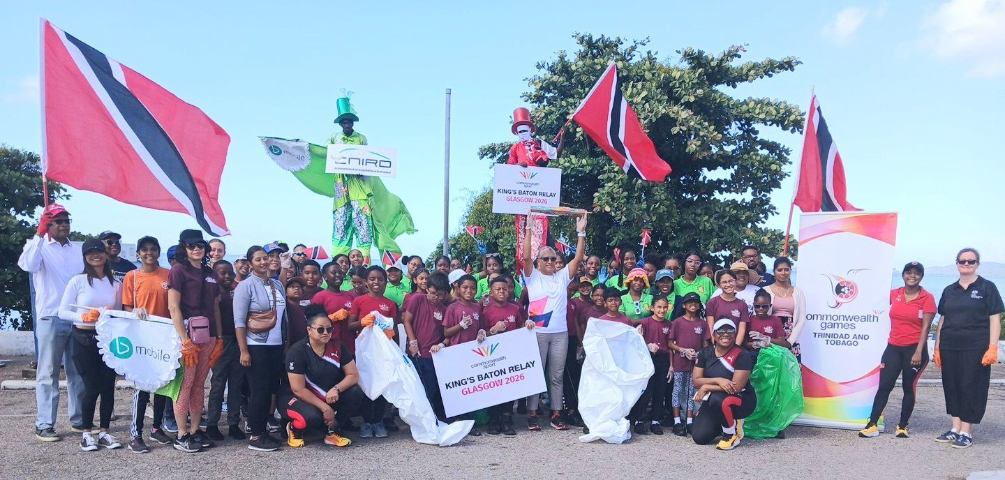 Students of St Bernadette Preparatory School (burgundy T-shirt) and St Francois Girls’ College (green T-shirt) before the start of the King’s Baton Relay Beach Clean-up at Invader’s Bay on the Foreshore, off St James yesterday. The Beach Cleanup is the first of several activities of the King’s Baton Relay across T&T.  Clayton Clarke (Image obtained at guardian.co.tt)