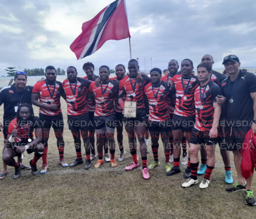 TT rugby men's players and staff celebrate their second-place finish at the 2024 Rugby Americas North Sevens tournament last November. - File photo by Roneil Walcott (Trinidad and Tobago Newsday)