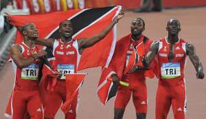 In this file photo, (from L) TT's Keston Bledman, Emmanuel Callender, Richard Thompson and Marc Burns celebrate after winning silver in the men's 4×100m relay final at the National Stadium during the 2008 Beijing Olympic Games on August 22, 2008. In this file photo, (from L) TT's Keston Bledman, Emmanuel Callender, Richard Thompson and Marc Burns celebrate after winning silver in the men's 4×100m relay final at the National Stadium during the 2008 Beijing Olympic Games on August 22, 2008.