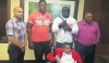 WELL DONE! Proud members of the T&T Paralympic Association, from second left: Akeem Stewart, Carlos Greene, Pradeep Vishnu and Sudhir Ramessar (front) at the VIP Lounge of the Piarco International Airport on Monday night with Ronson Hackshaw, the Assistant Director, Physical Education of the Ministry of Sports and Youth Affairs. WELL DONE! Proud members of the T&T Paralympic Association, from second left: Akeem Stewart, Carlos Greene, Pradeep Vishnu and Sudhir Ramessar (front) at the VIP Lounge of the Piarco International Airport on Monday night with Ronson Hackshaw, the Assistant Director, Physical Education of the Ministry of Sports and Youth Affairs.